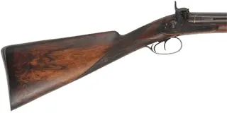 Antique Double Barrel Shotgun,
14 gauge, 30-1/2" Damascus barrels,
percussion, repaired walnut, engraved iron furniture, 
marked J.D. Hartmann in Hamburg